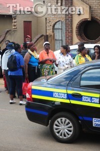 Memebers of the public start to gather at the house in Vosloorus, where Bafana Bafana Captain Senzo Meyiwa was shot dead last night, 27 October 2014. Picture: Tracy Lee Stark