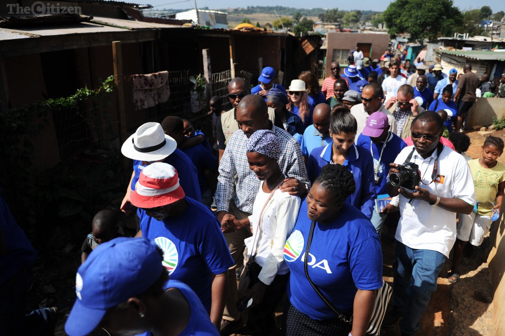 Democratic Alliance leader Mmusi Maimane walks through Zandspruit on Freedom Day, 27 April 2016, as he meets with residents to discuss their needs. Picture: Michel Bega