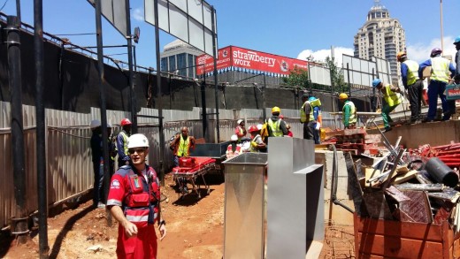 Paramedics assist the injured. Picture: Sandton Chronicle.