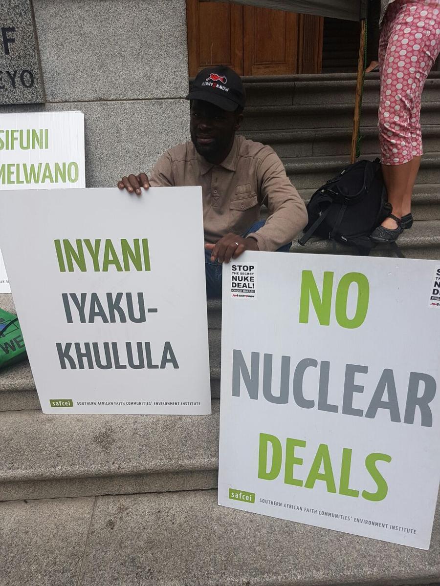 Environmental activists celebrate outside the Western Cape High Court on Wednesday after the court found government's nuclear procurement processes to be unlawful and unconstitutional. PHOTO: Catherine Rice/ANA