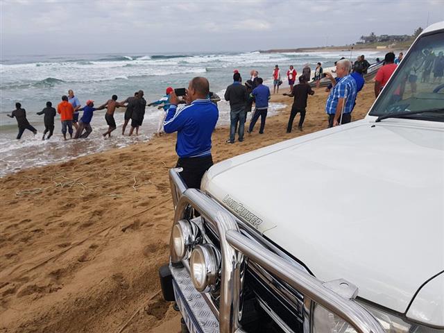 Scottburgh Beach was a hive of activity this morning when sardines were netted. Picture: South Coast Herald