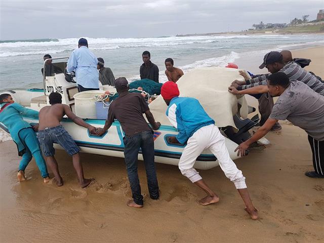 Scottburgh Beach was a hive of activity this morning when sardines were netted. Picture: South Coast Herald