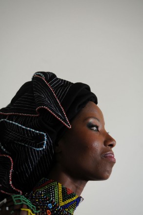 Miss Earth South Africa Ashanti Mbanga looks on during her offical send off in Hyde Park, 06 November 2013. Ashanti will be representing South Africa at the International Miss Earth finals in South East Asia and the head scarf she is wearing is part of her traditional outfit for the pageant.  Picture: Refilwe Modise
