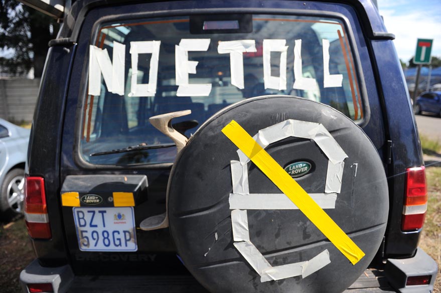 FILE PICTURE: E-toll objectors gather, 25 January 2014, at the Portuguese Hall in Joburg South, before taking part in a mass protest drive along the tolled highways. Picture: Michel Bega