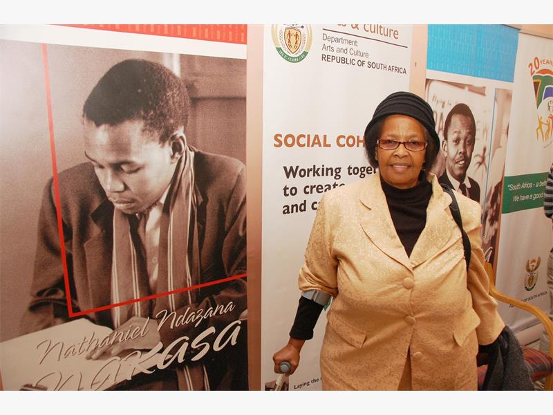 Gladys Maphumulo sister to Nat Nakasa walks past to some of his photographs after the media briefing wich was held in Durban. Picture Phumlani Thabethe Date 02 July 2014