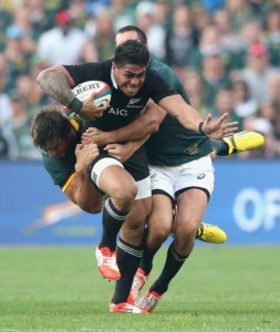 Malakai Fekitoa of the All Blacks is tackled by Eben Etzebeth (L) and Jan Serfontein during the Rugby Championship match between the South African Springboks and the New Zealand All Blacks at Ellis Park Stadium on October 4, 2014 in Johannesburg, South Africa. (Photo by David Rogers/Getty Images)
