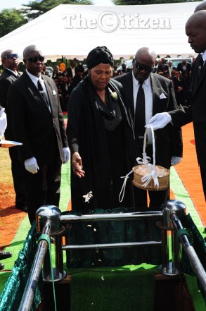 Late John 'Shoes' Moshoeu's mother Renny (c) her pays her last respect  at the West Park Cemetry in Johannesburg, 27 April 2015. Picture: Nigel Sibanda
