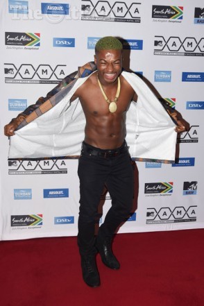 Television presenter Cyprian Ndlovu poses for pictures on the red carpet at the 5th annual MTV Africa Music Awards in held Durban, 18 July 2015. The award show also celebrates the 10 year anniversary of MTV Base with this year’s theme being “Evolution”.  Picture: Refilwe Modise