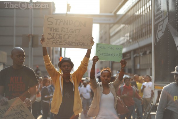 Wits students march through the Johannesburg CBD to Luthuli House, 22 October 2015, during the #FeesMustFall national protest. Students gathered outside the ruling party’s offices where they handed over a memorandum of grievances. Picture: Alaister Russell