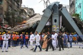 Three employees appear in court over India flyover collapse