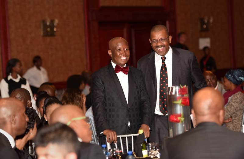 Malema with EFF chairperson Dali Mpofu at the gala dinner in Polokwane on Saturday night. Picture: Nigel Sibanda