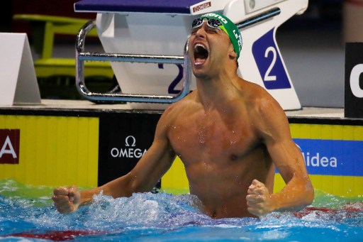 Redemption: Chad le Clos is pumped after breaking his own 200m butterfly world record. Photo: Gregory Shamus/AFP. 