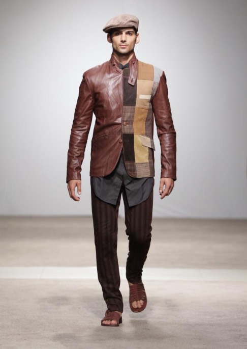 A model showcases an interesting patchwork jacket from designer's Sheldon Kopman's Naked Ape label. This jacket is part of the label's "Borrow Borrow" collection, showcased at the Lexus South African Menswear Week A/W 2017. Picture: SDR / Simon Denier.