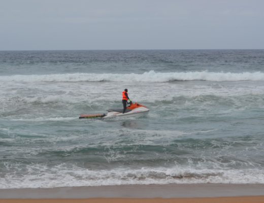 Emergency services are searching for the body of the young man who drowned at Salmon Bay beach this morning.
