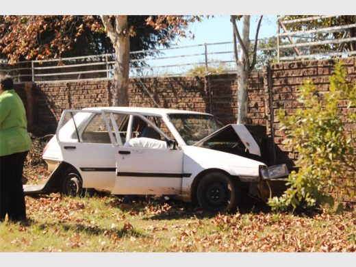 A vehicle crashed into the perimeter wall of a residential complex.