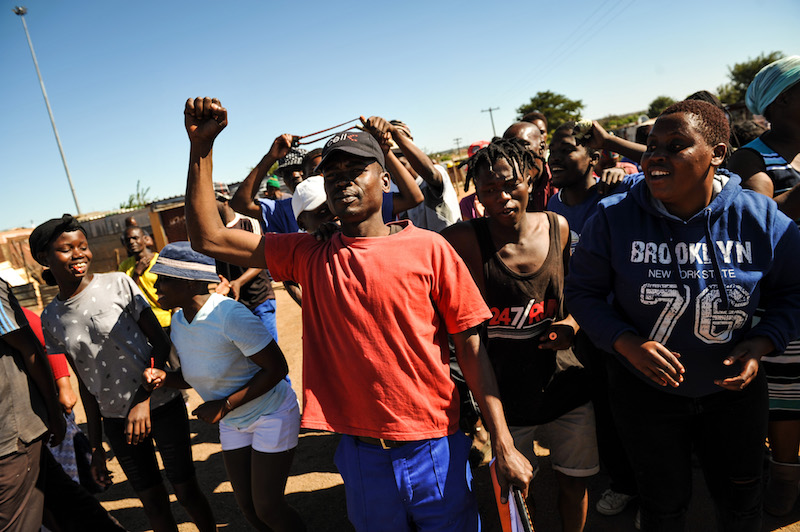 Residents of Soshanguve Block KK are seen singing and dancing during a service delivery protest, they demand to have proper electricity and housing and vowed to continue their protest untill their needs are met, 17 May 2017, Soshanguve, Pretoria. Picture: Jacques Nelles