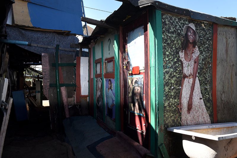 One of the shacks at the rear of the premises is decorated with various posters. Picture - Neil McCartney