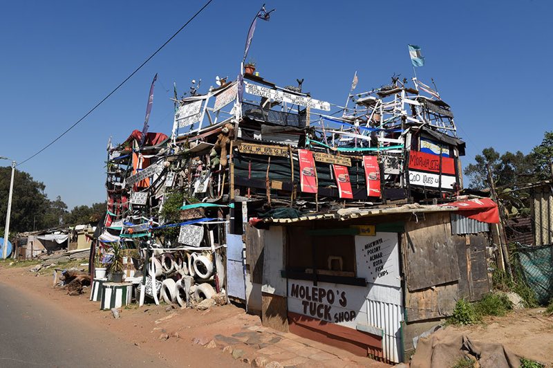 Johannes Morula City dwarfs the neighbouring tuckshop.