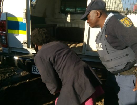 mbisa South SAPS removing Sarah Mosese in Vusimuzi Informal Settlement after she was caught inside a locked shack room of an 11-year-old boy.