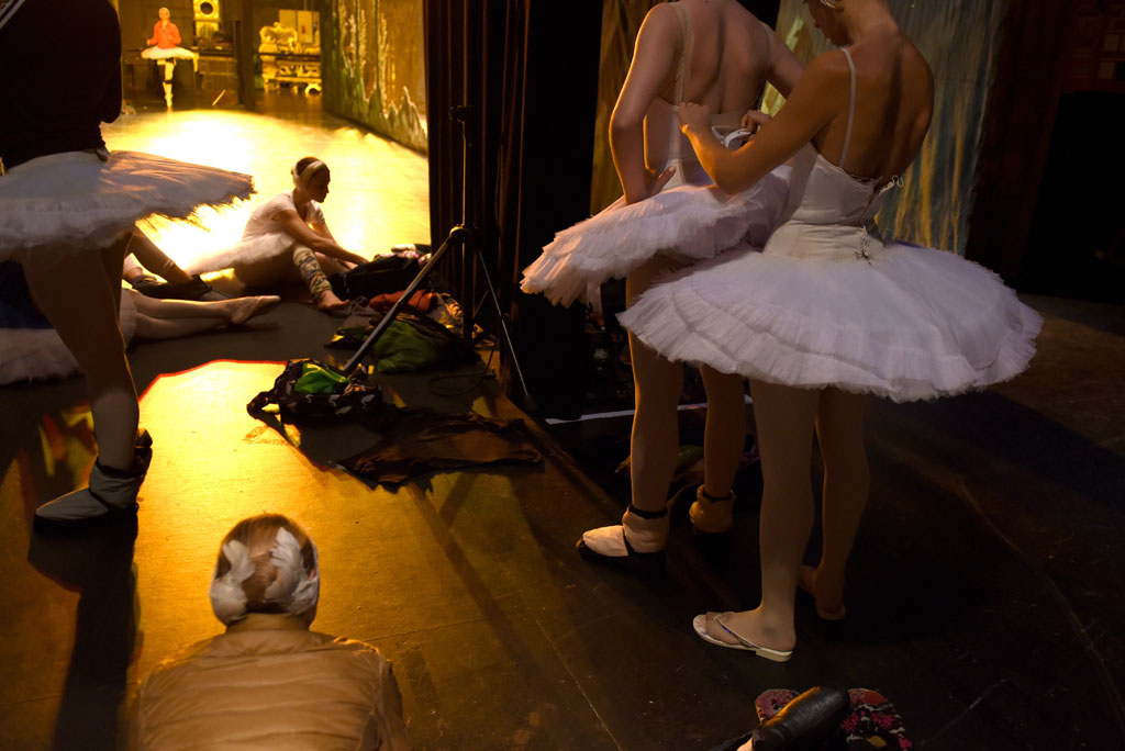 Ballerinas help each other get dressed backstage ahead of a performance. Picture: Tracy Lee Stark