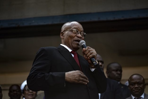Former South African president Jacob Zuma addresses supporters gathered outside the KwaZulu-Natal High Court in Durban on April 6, 2018, after appearing for a brief preliminary hearing on corruption charges linked to a multi-billion dollar 1990s arms deal. Picture: AFP PHOTO