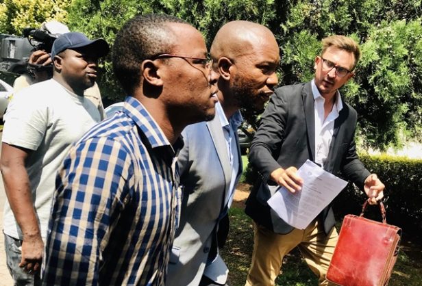 DA leader Mmusi Maimane with the Zimbabwean activists at the Zimbabwe Embassy in Pretoria on Thursday, 31 January 2019. Picture: African News Agency (ANA)