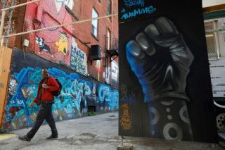 Toronto's 'Graffiti Alley' repainted to honour George ...