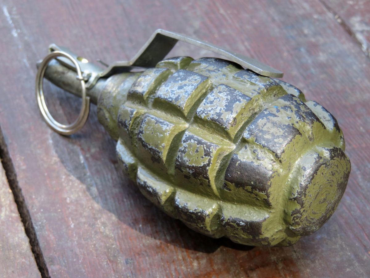 A hand grenade on a table