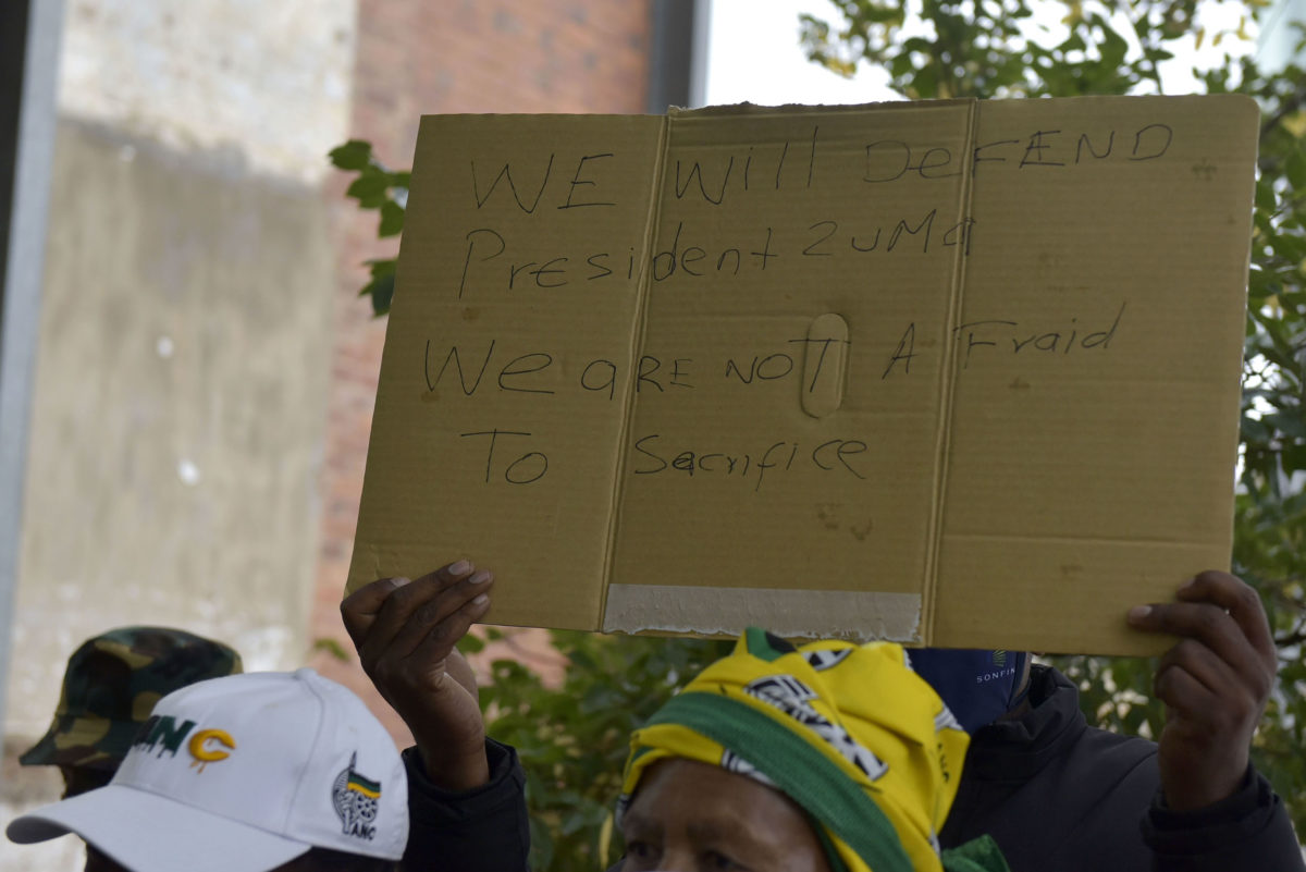 Pro Zuma supporters outside the Constitutional Court in Braamfontein, 25 March 2021. A group of ANC members protested in support of Zuma ahead of the courts desision on whether he was in contempt of a previous ruling, whilst a bigger group of protestors from Action SA and Move One Million counter protested. Picture: Neil McCartney