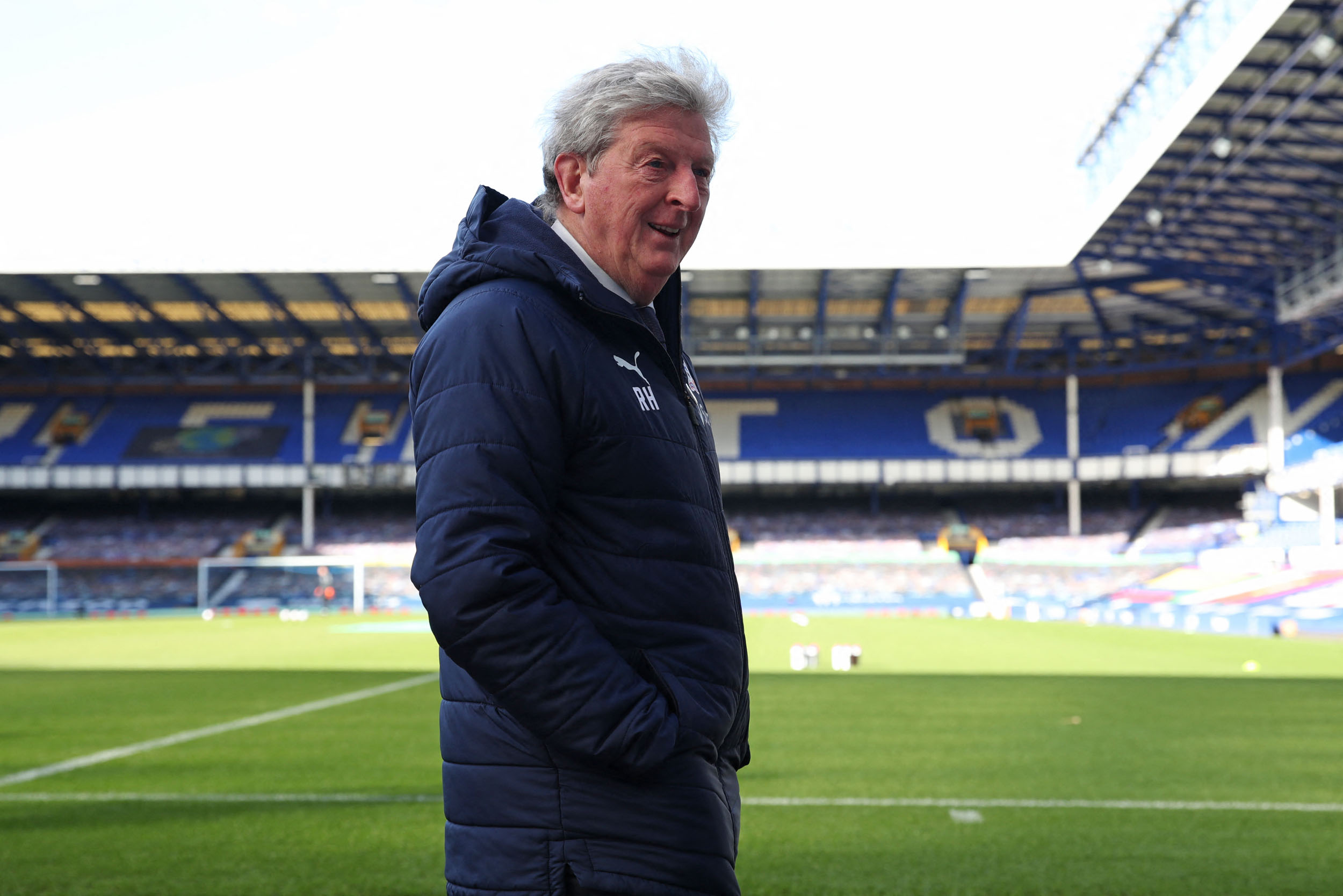 Crystal Palace's English manager Roy Hodgson checks out the conditions ahead of the English Premier League football match between Everton and Crystal Palace at Goodison Park in Liverpool, north west England on April 5, 2021. (Photo by Clive Brunskill / POOL / AFP) / RESTRICTED TO EDITORIAL USE. No use with unauthorized audio, video, data, fixture lists, club/league logos or 'live' services. Online in-match use limited to 120 images. An additional 40 images may be used in extra time. No video emulation. Social media in-match use limited to 120 images. An additional 40 images may be used in extra time. No use in betting publications, games or single club/league/player publications. /