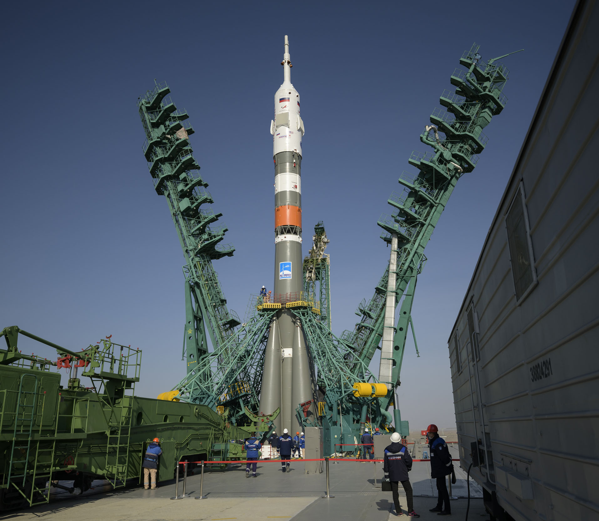 A handout photo made available by NASA shows the service structure being lifted into position around the Soyuz rocket at the launch pad at Site 31 at the Baikonur Cosmodrome in Kazakhstan, 06 April 2021. Expedition 65 NASA astronaut Mark Vande Hei, Roscosmos cosmonauts Pyotr Dubrov and Oleg Novitskiy are scheduled to launch aboard their Soyuz MS-18 spacecraft on 09 April. EPA-EFE/NASA/Bill Ingalls HANDOUT MANDATORY CREDIT: (NASA/Bill Ingalls) AFS 8/101 - Permanent HANDOUT EDITORIAL USE ONLY/NO SALES