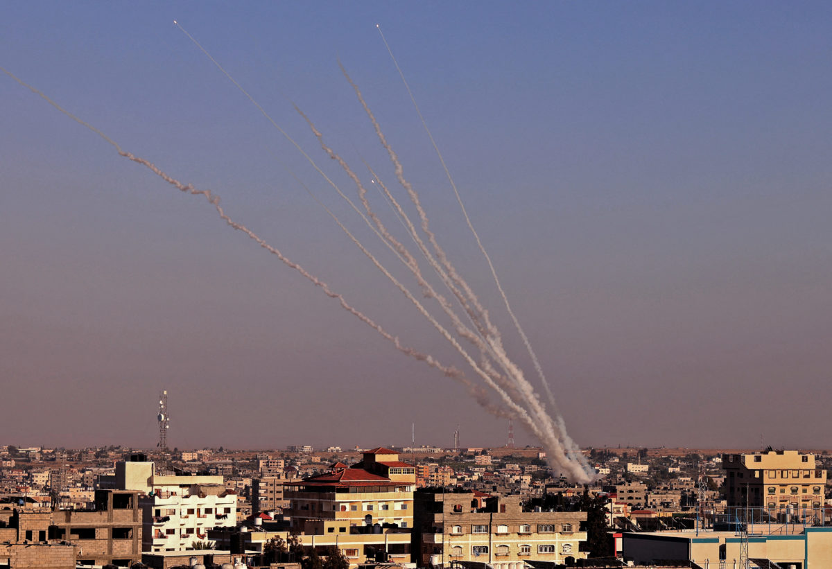 Rockets are launched towards Israel from Rafah, in the southern the Gaza Strip, controlled by the Palestinian Hamas movement, on 12 May 2021. Heavy exchanges of rocket fire and air strikes, and rioting in mixed Jewish-Arab towns, fuelled fears today that deadly violence between Israel and Palestinians could spiral into ‘full-scale war’. Picture: Said Khatib/AFP