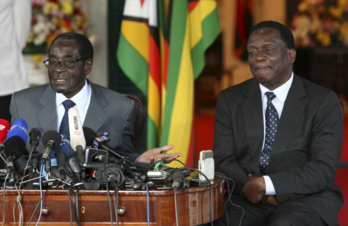 FILE PICTURE: Zimbabwean President Robert Mugabe and Emmerson Mnangagwa at the Presidential State House on July 30, 2013, in Harare, Zimbabwe. (Photo by Gallo Images / Sunday Times / Simphiwe Nkwali)