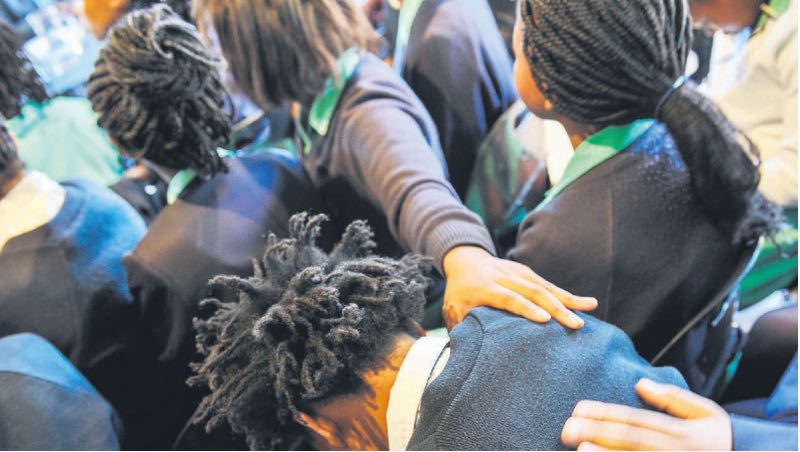  A girl becomes emotional while her peers speak to Gauteng Education MEC Panyaza Lesufi about the racism they’ve experienced at Pretoria High School for Girls yesterday. Picture: Jacques Nelles