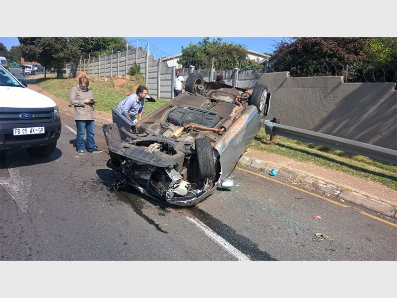 Curious bystanders inspect the vehicle. (Photo: Supplied)