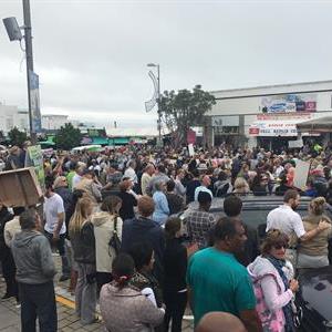 The crowd not only chanted "Zuma must fall" in unison but also stood together, holding hands and singing the national anthem. Picture: Yolandé Stander.