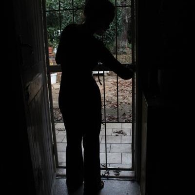 The 21-year-old woman climbed through the doggy door to escape (bottom right opening). Photograph: James Mahlokwane