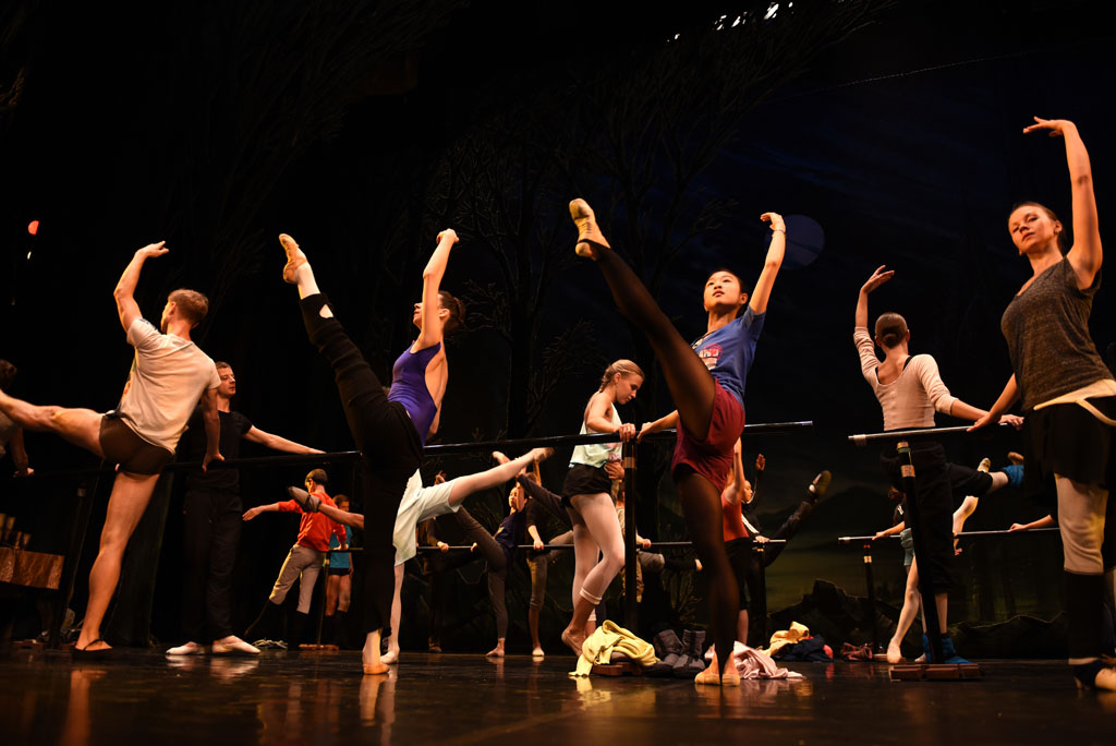Ballet dancers from the Russian Ballet theatre practice on the barre before a full dress rehearsal for Swan Lake. Picture: Tracy Lee Stark