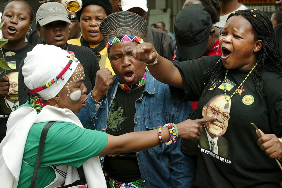 Supporters of President Jacob Zuma in full cry outside the court during his 2006 rape trial. Picture: EPA