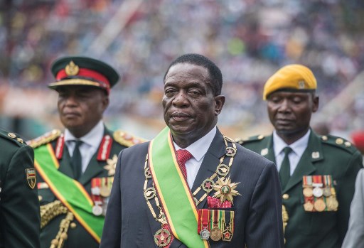 New interim Zimbabwean President Emmerson Mnangagwa looks on after he was officially sworn-in during a ceremony in Harare on November 24, 2017. Picture: AFP Photo / Mujahid Safodien.