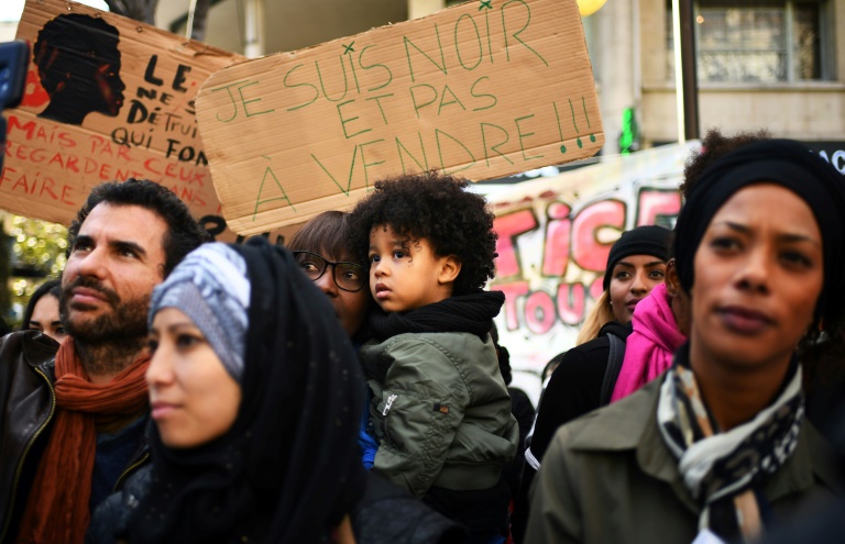   People take part in a demonstration against slavery in Libya, on November 25, 2017 in Marseille, southern France 