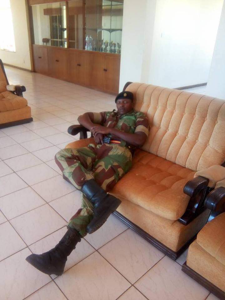 A soldier catches a nap inside the ''Blue Roof', 15 November. Facebook.