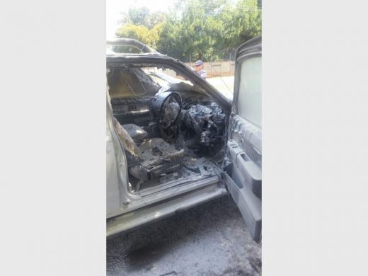 The burnt-out interior of the police van