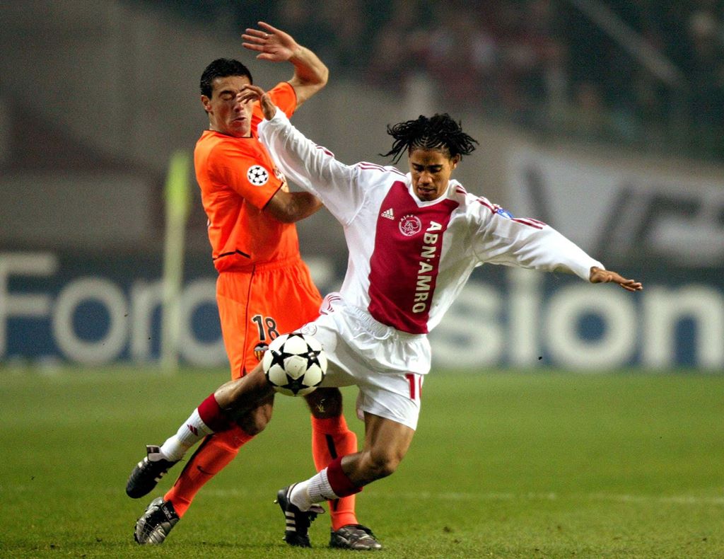 Valencia's Kily Gonzalez, left, fights for the ball with Steven Pienaar of Ajax Amsterdam during their Champions League 2nd round match on March 11, 2003, in Amsterdam. Picture: AFP