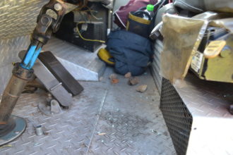The stones used to smash the windows lie next to the foot pedals inside the truck Photo by Muzi Zincume