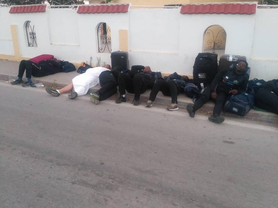 Divvy and his Zimbabwe players sleeping on the streets!